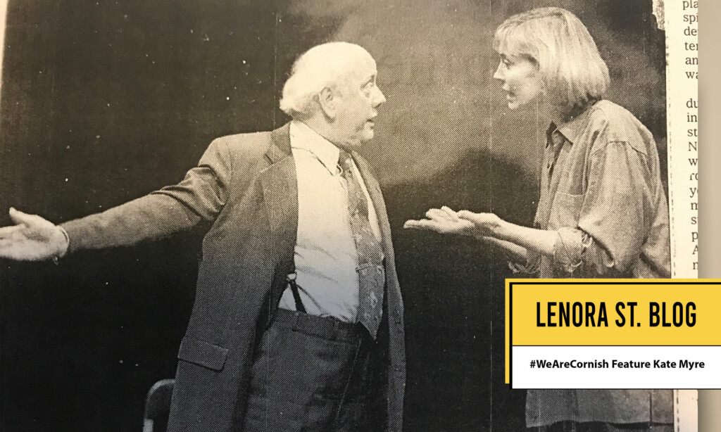 A newspaper clipping of a photo of two people.