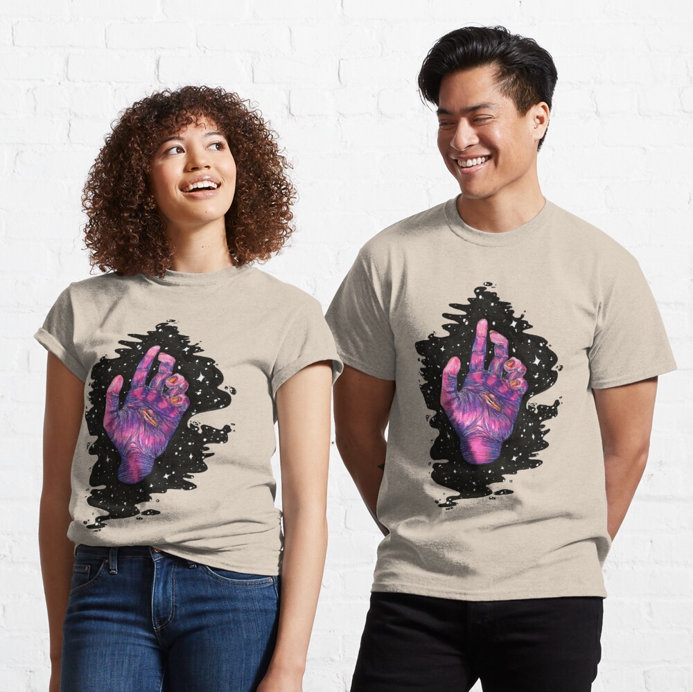 Two people wearing matching shirts.